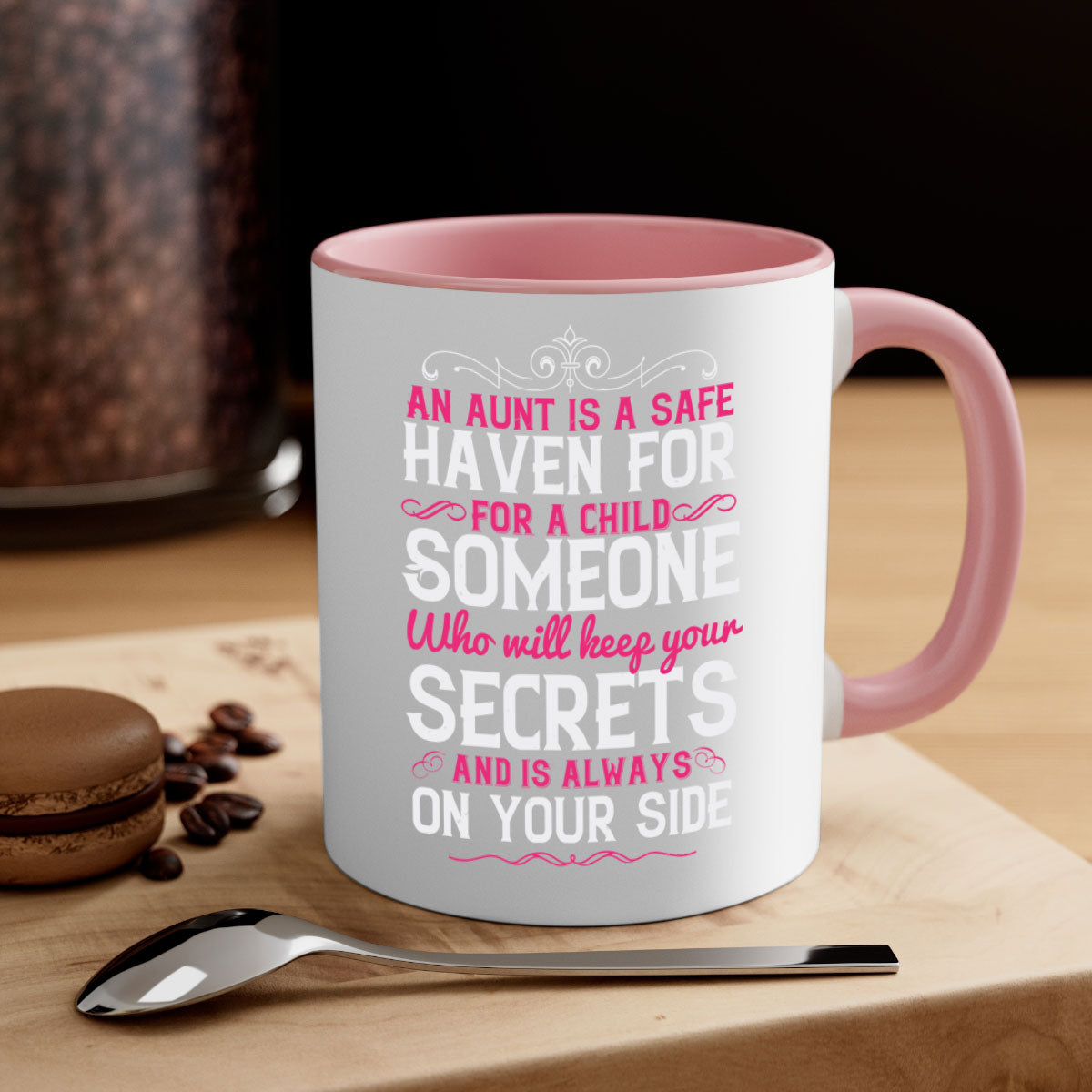 A two-tone ceramic mug with a glossy finish, featuring the phrase 'An Aunt is a Safe Haven for a Child' in a stylish font, available in multiple colors.