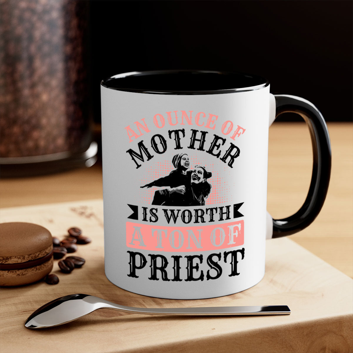 A two-tone ceramic mug with a colored handle and glossy finish, featuring the quote 'An Ounce of Mother is Worth a Ton of Priest'.