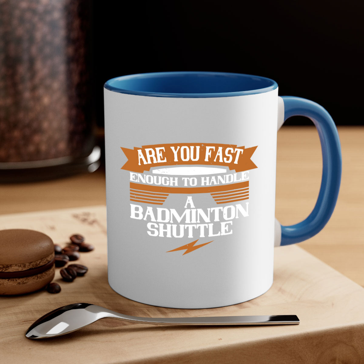 A stylish two-tone ceramic mug featuring a badminton shuttle design, available in multiple colors with a glossy finish and easy-grip handle.