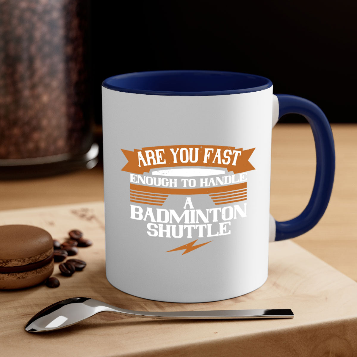 A stylish two-tone ceramic mug featuring a badminton shuttle design, available in multiple colors with a glossy finish and easy-grip handle.