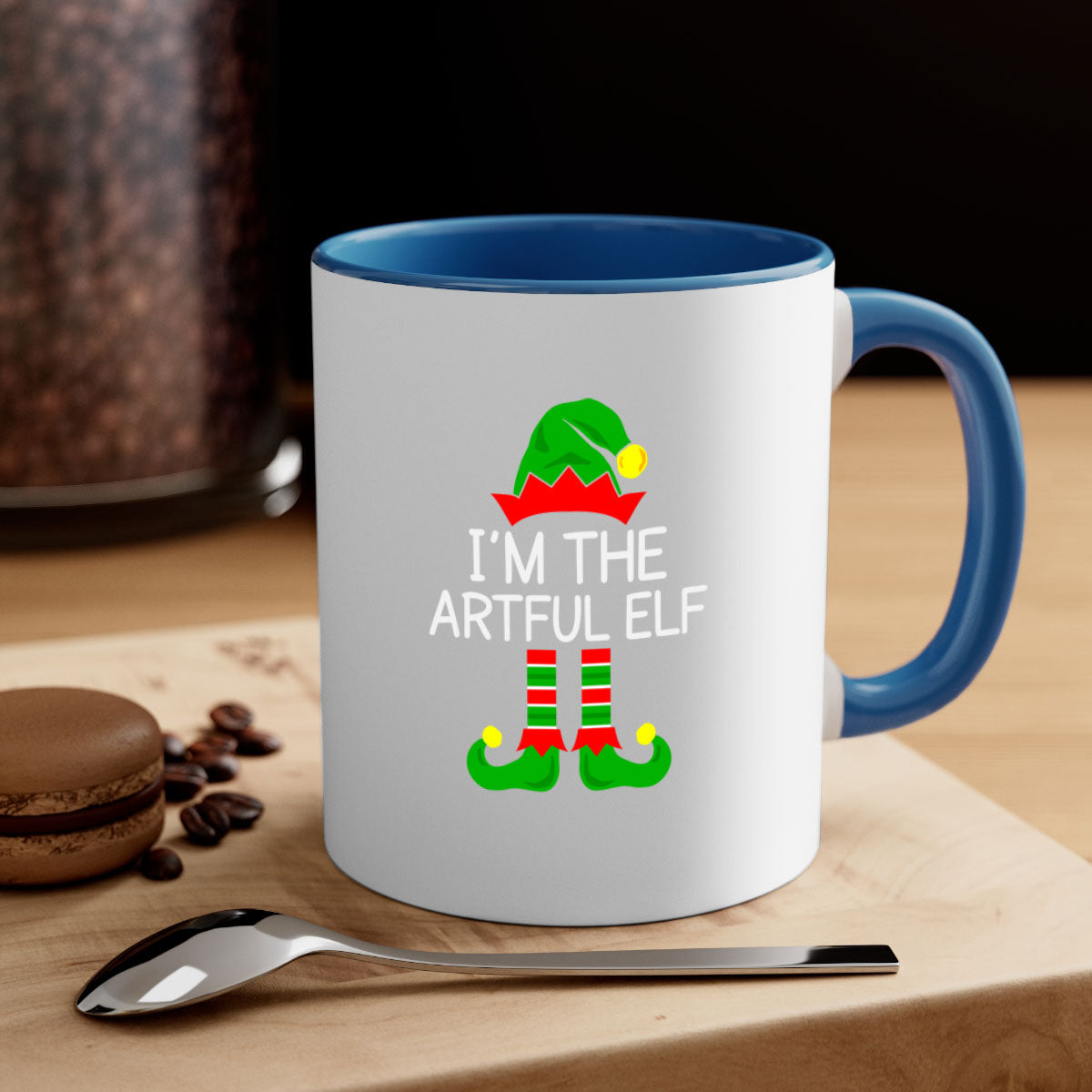 Artful elf style Christmas mug with colorful handle and glossy finish, available in multiple colors and sizes.