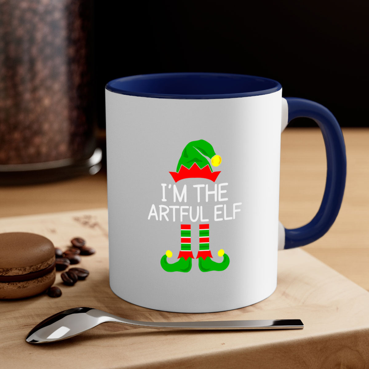 Artful elf style Christmas mug with colorful handle and glossy finish, available in multiple colors and sizes.
