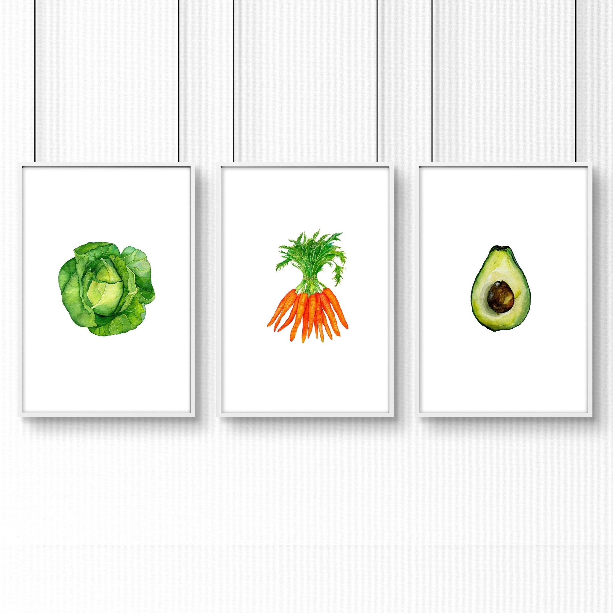 Set of 3 framed vegetable prints showcasing vibrant illustrations of vegetables, perfect for kitchen decor.