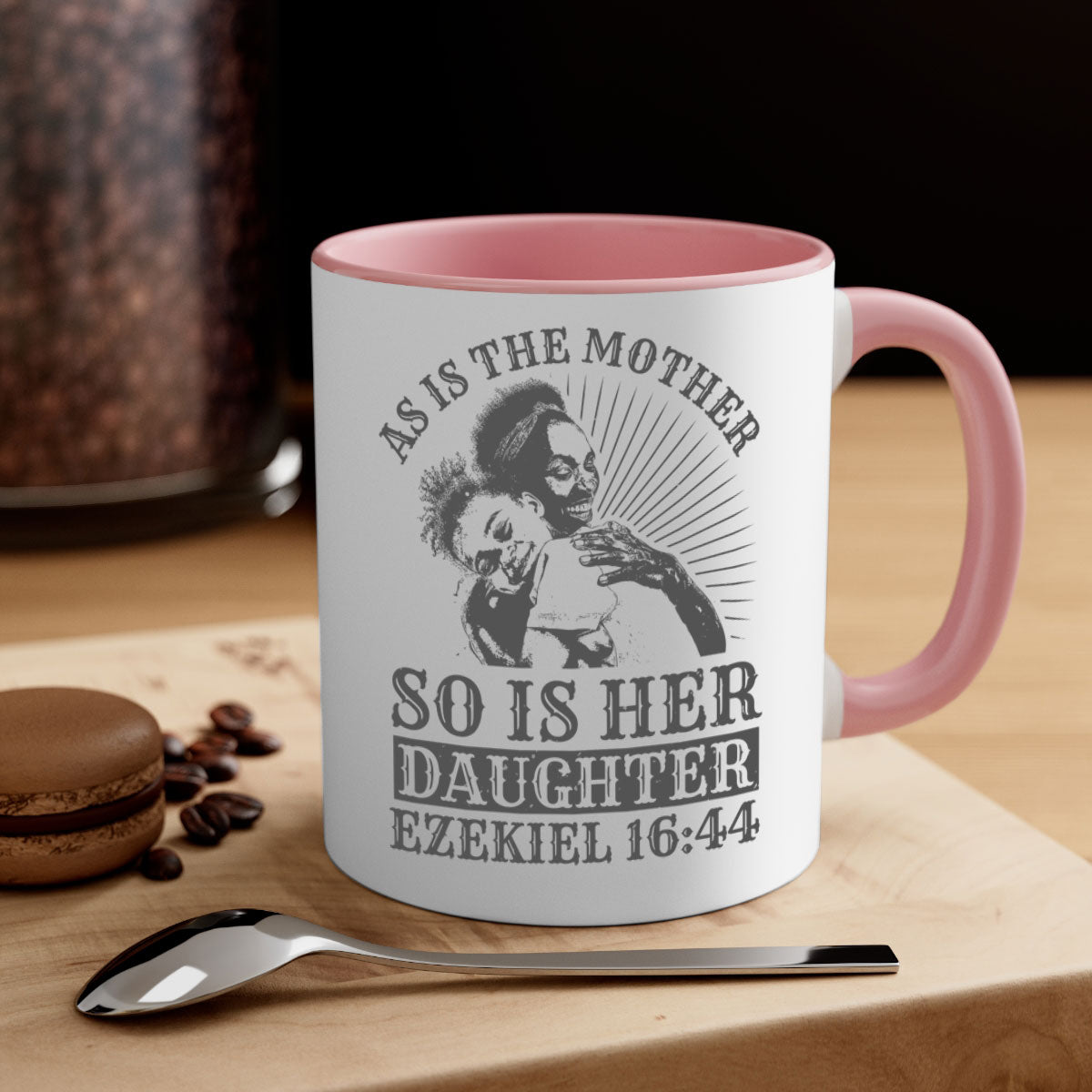 Two-tone ceramic mug with colored handle and interior, featuring the phrase 'As Is the Mother So Is Her Daughter' in elegant font.