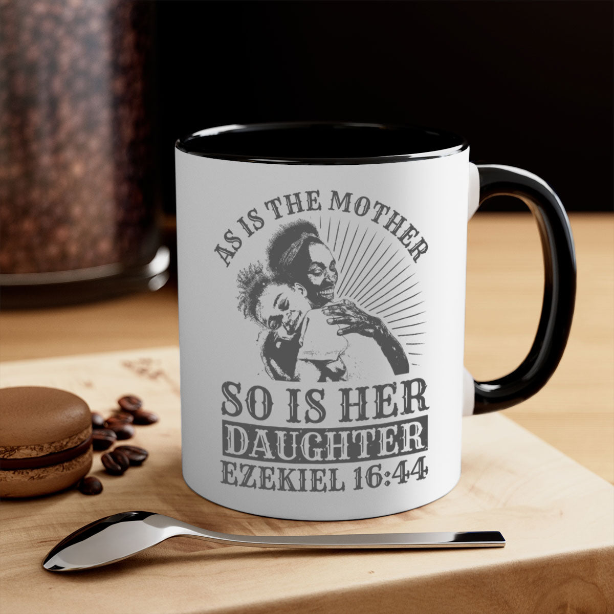 Two-tone ceramic mug with colored handle and interior, featuring the phrase 'As Is the Mother So Is Her Daughter' in elegant font.