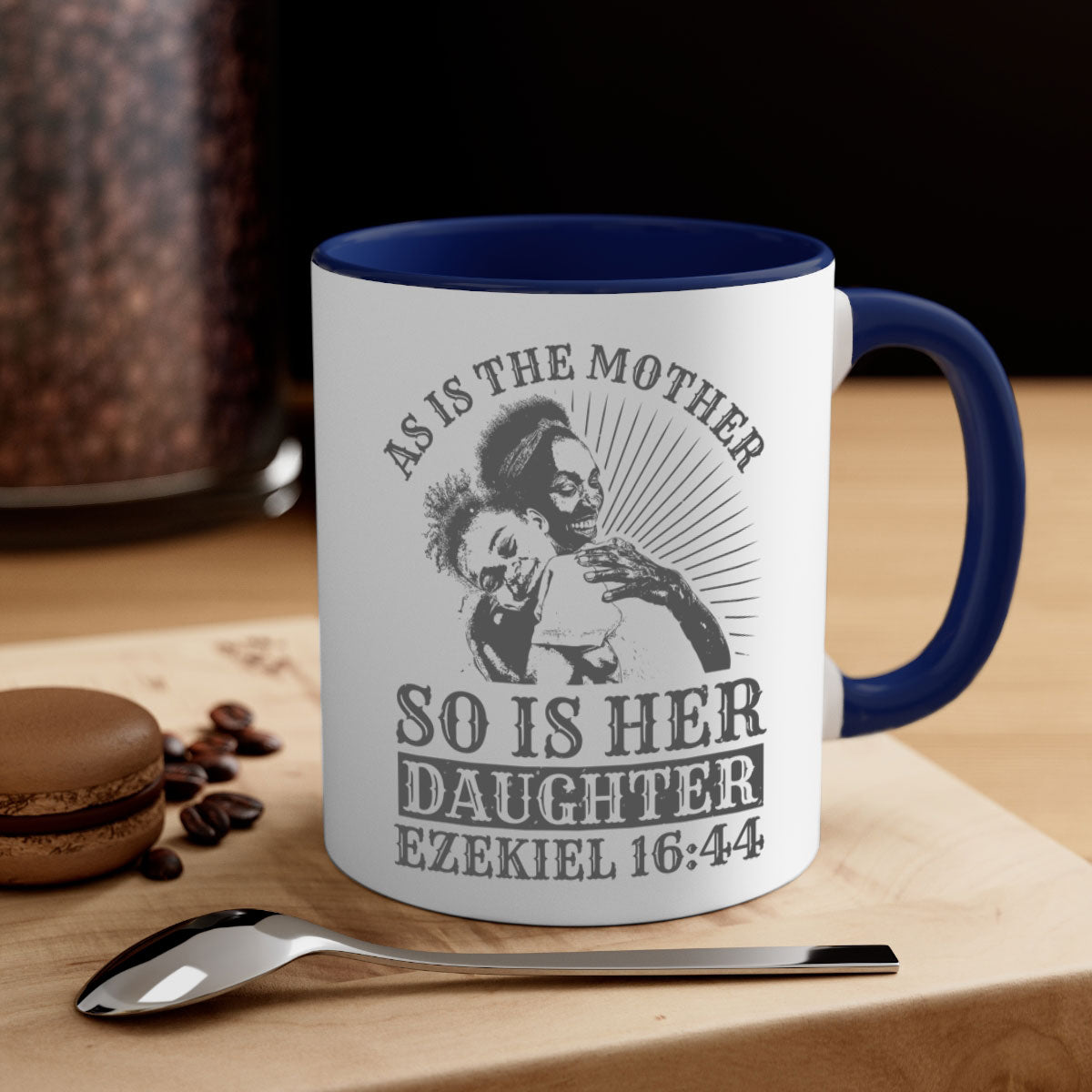 Two-tone ceramic mug with colored handle and interior, featuring the phrase 'As Is the Mother So Is Her Daughter' in elegant font.