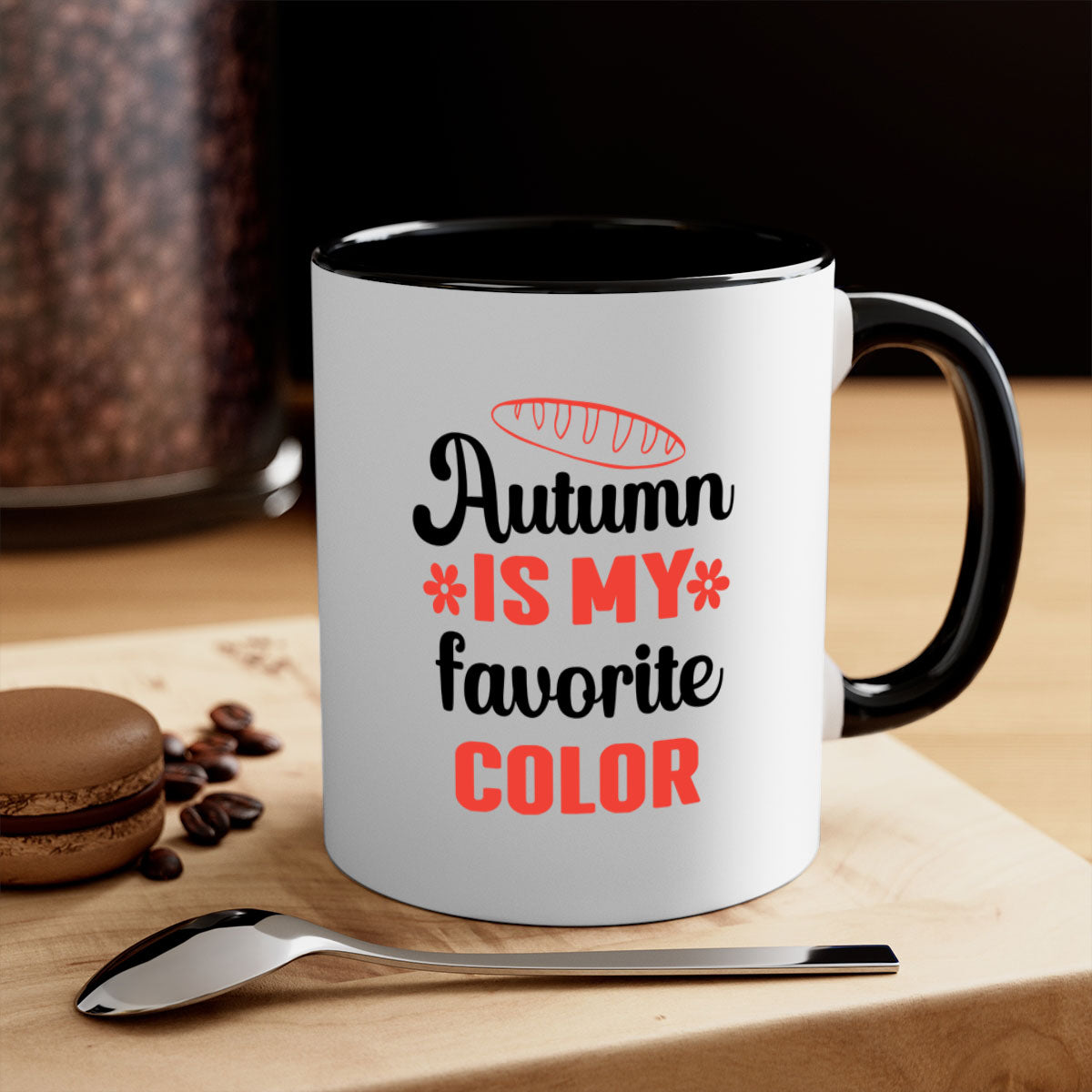 A two-tone ceramic mug featuring the phrase 'Autumn is my favorite color', available in five colors with a glossy finish and C-shaped handle.