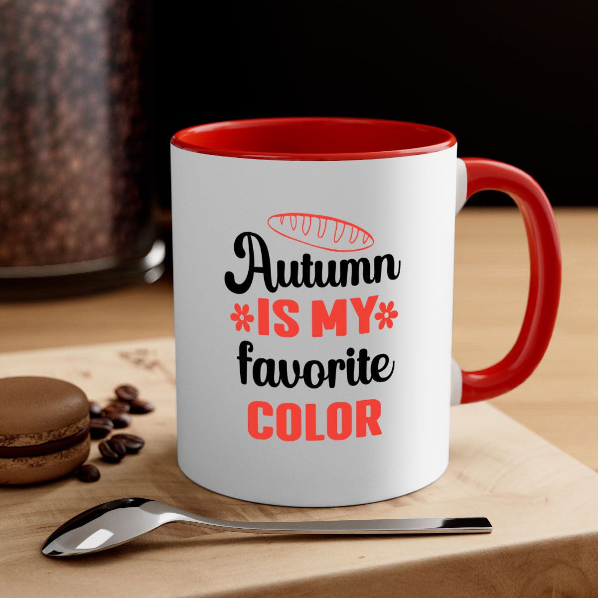 A two-tone ceramic mug featuring the phrase 'Autumn is my favorite color', available in five colors with a glossy finish and C-shaped handle.