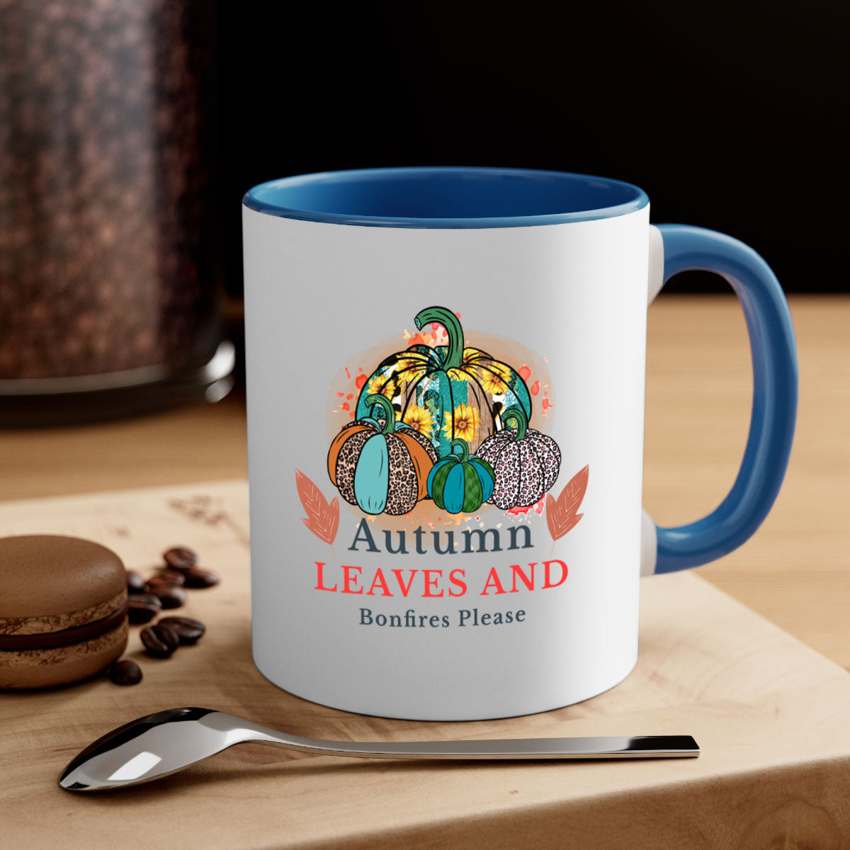 A stylish two-tone ceramic mug featuring the phrase 'Autumn Leaves And Bonfires Please', available in multiple colors with a glossy finish.