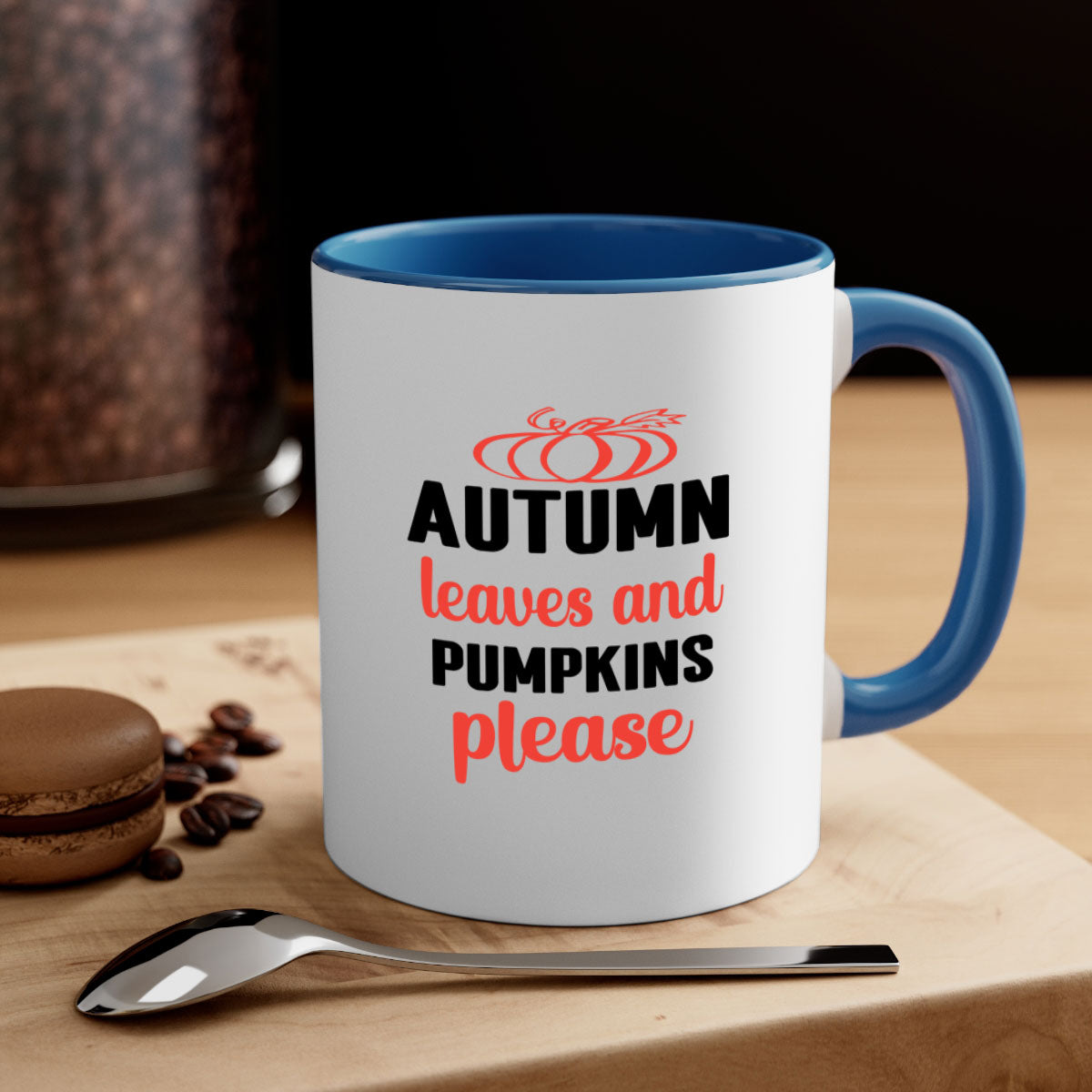 A two-tone ceramic mug featuring autumn leaves and pumpkins design, with a colored handle and glossy finish, available in multiple colors.