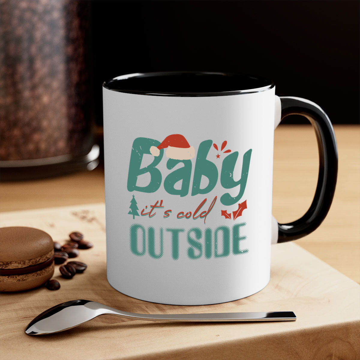 A stylish two-tone ceramic mug with the phrase 'Baby It's Cold Outside' printed on it, featuring a colored handle and glossy finish.