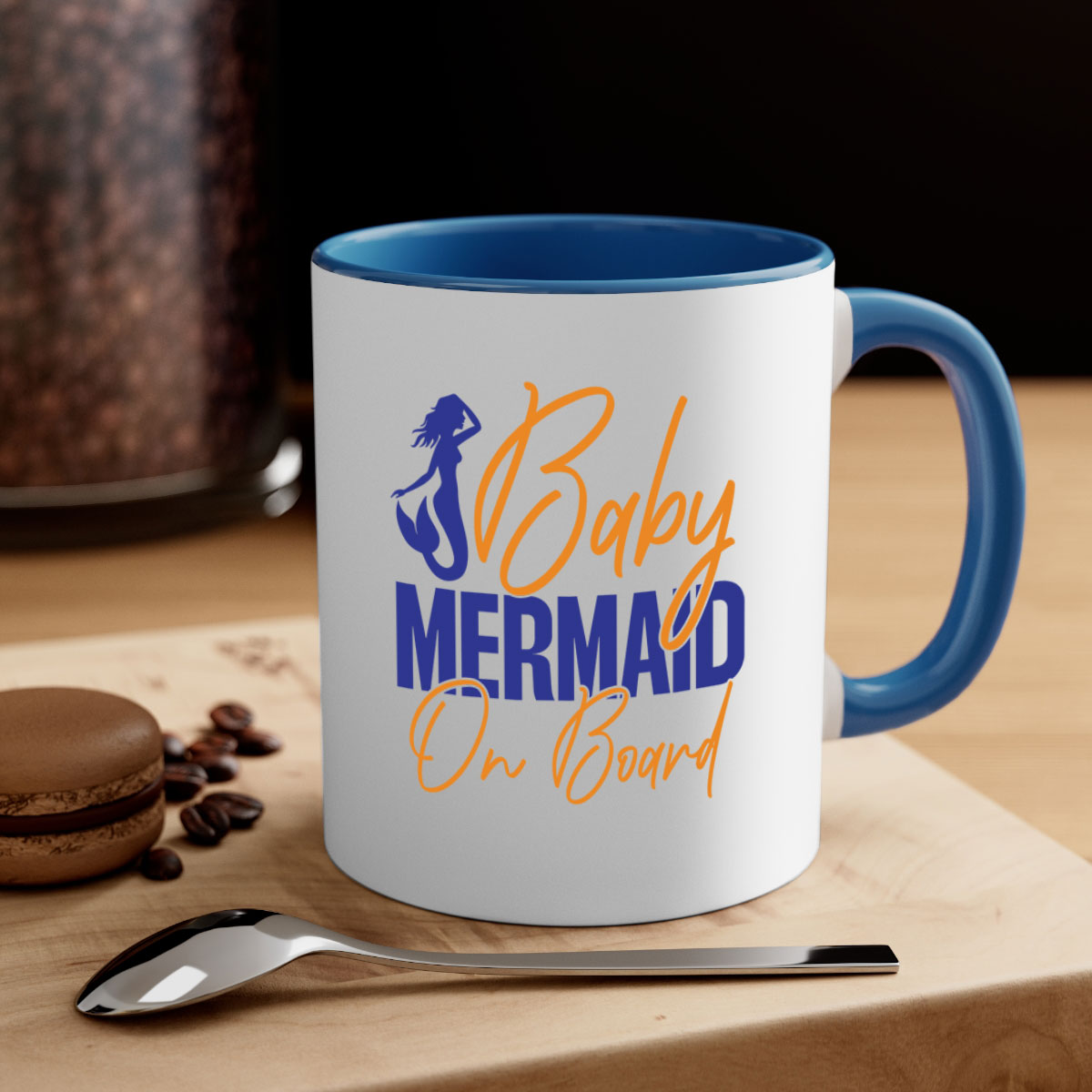 A colorful Baby Mermaid on Board mug featuring a glossy finish, available in multiple colors with a C-shaped handle.