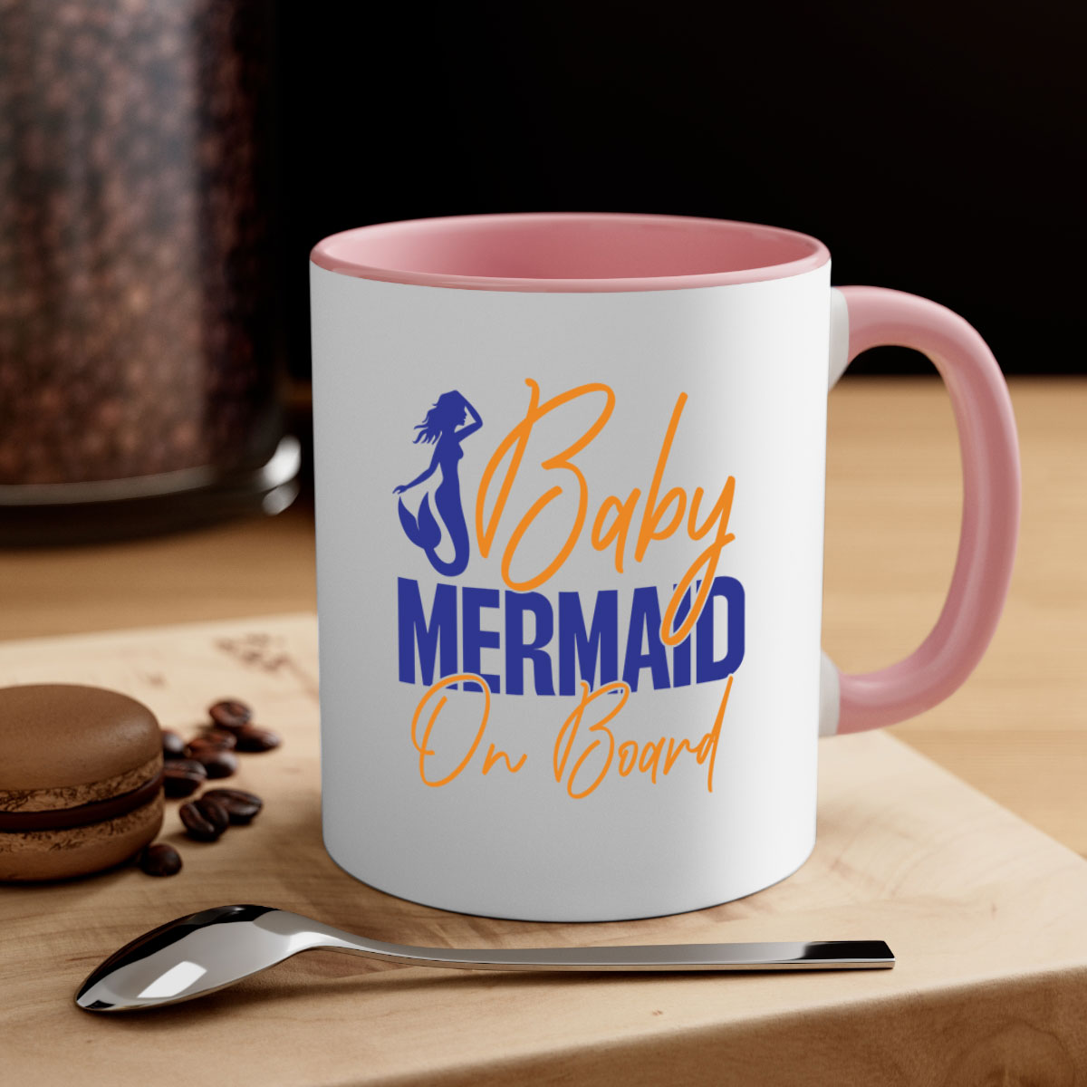 A colorful Baby Mermaid on Board mug featuring a glossy finish, available in multiple colors with a C-shaped handle.