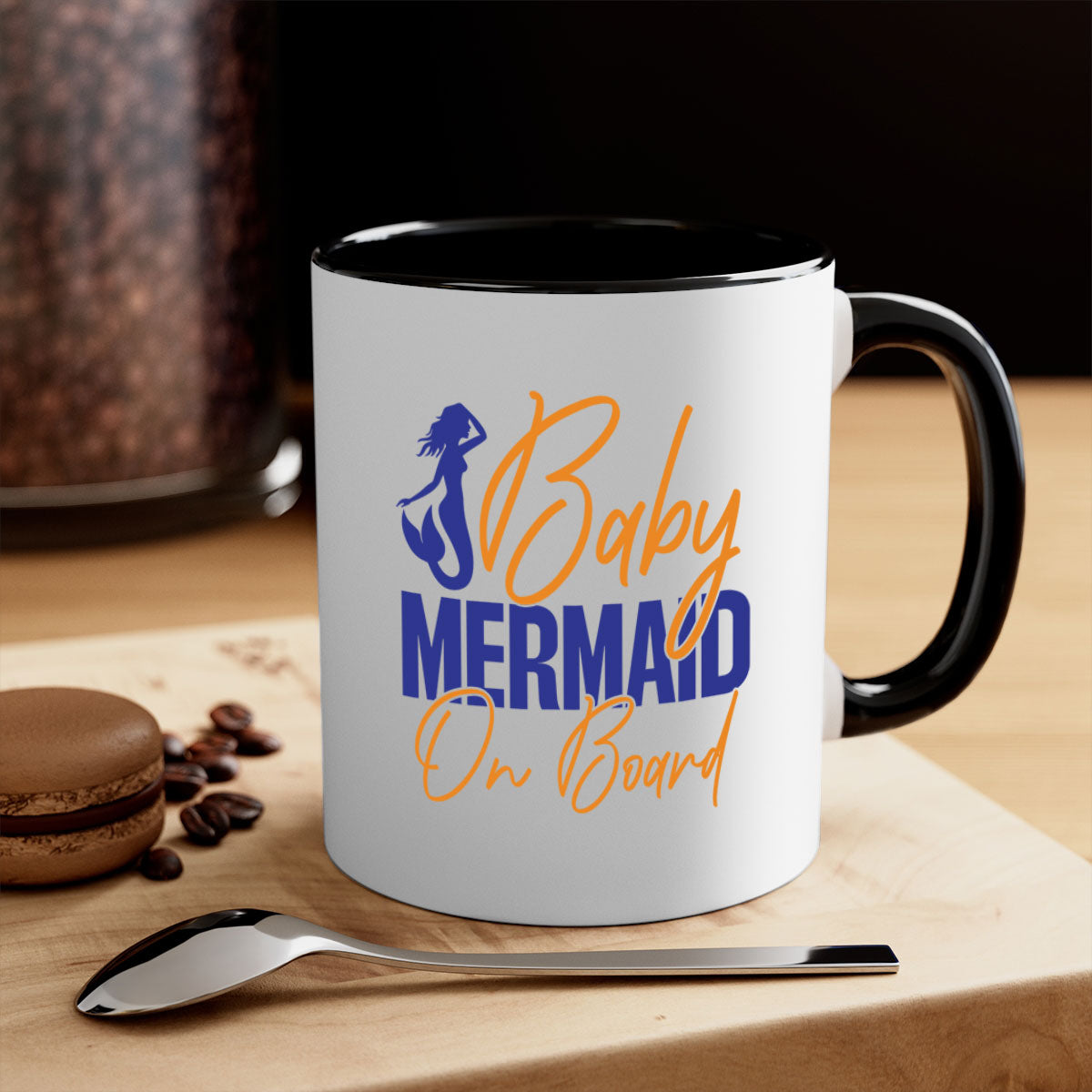 A colorful Baby Mermaid on Board mug featuring a glossy finish, available in multiple colors with a C-shaped handle.