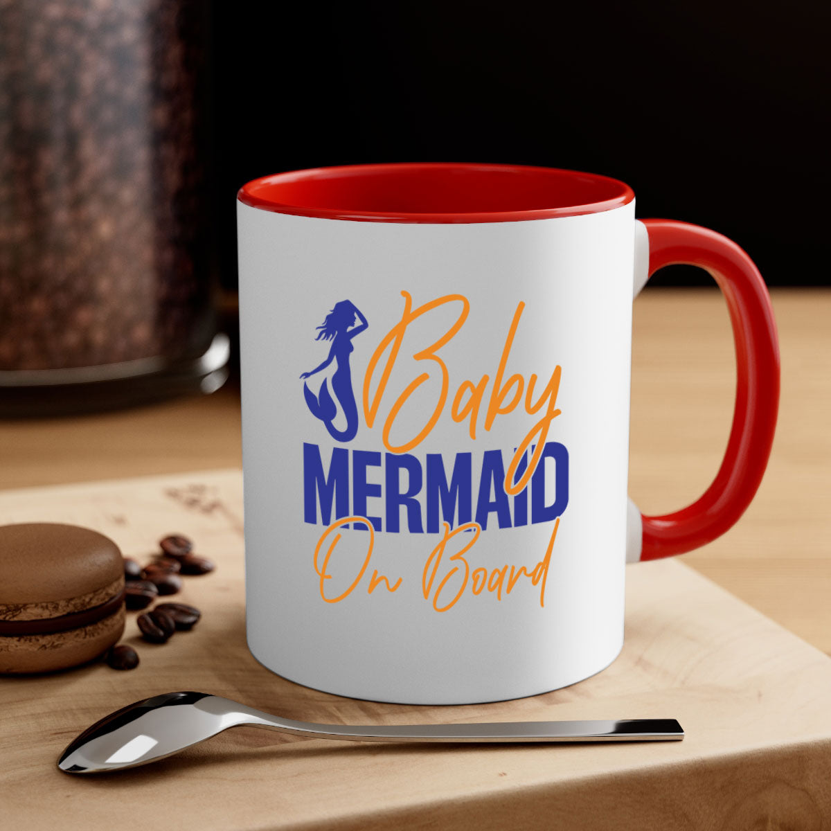 A colorful Baby Mermaid on Board mug featuring a glossy finish, available in multiple colors with a C-shaped handle.