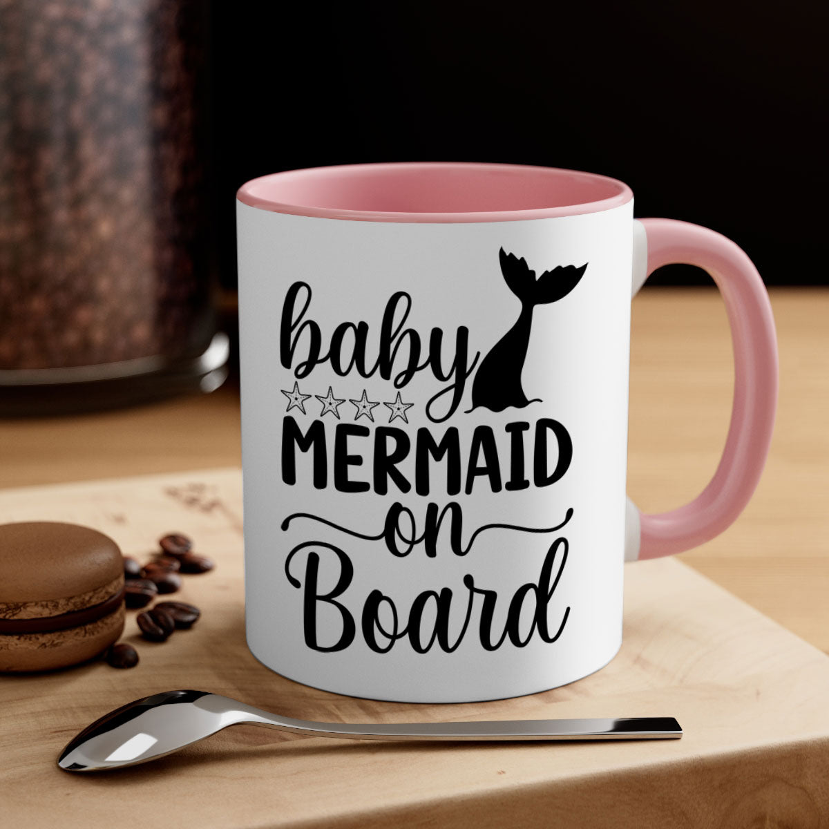 A colorful Baby Mermaid on Board Mug with a glossy finish, featuring a whimsical mermaid design and a comfortable C-shaped handle.