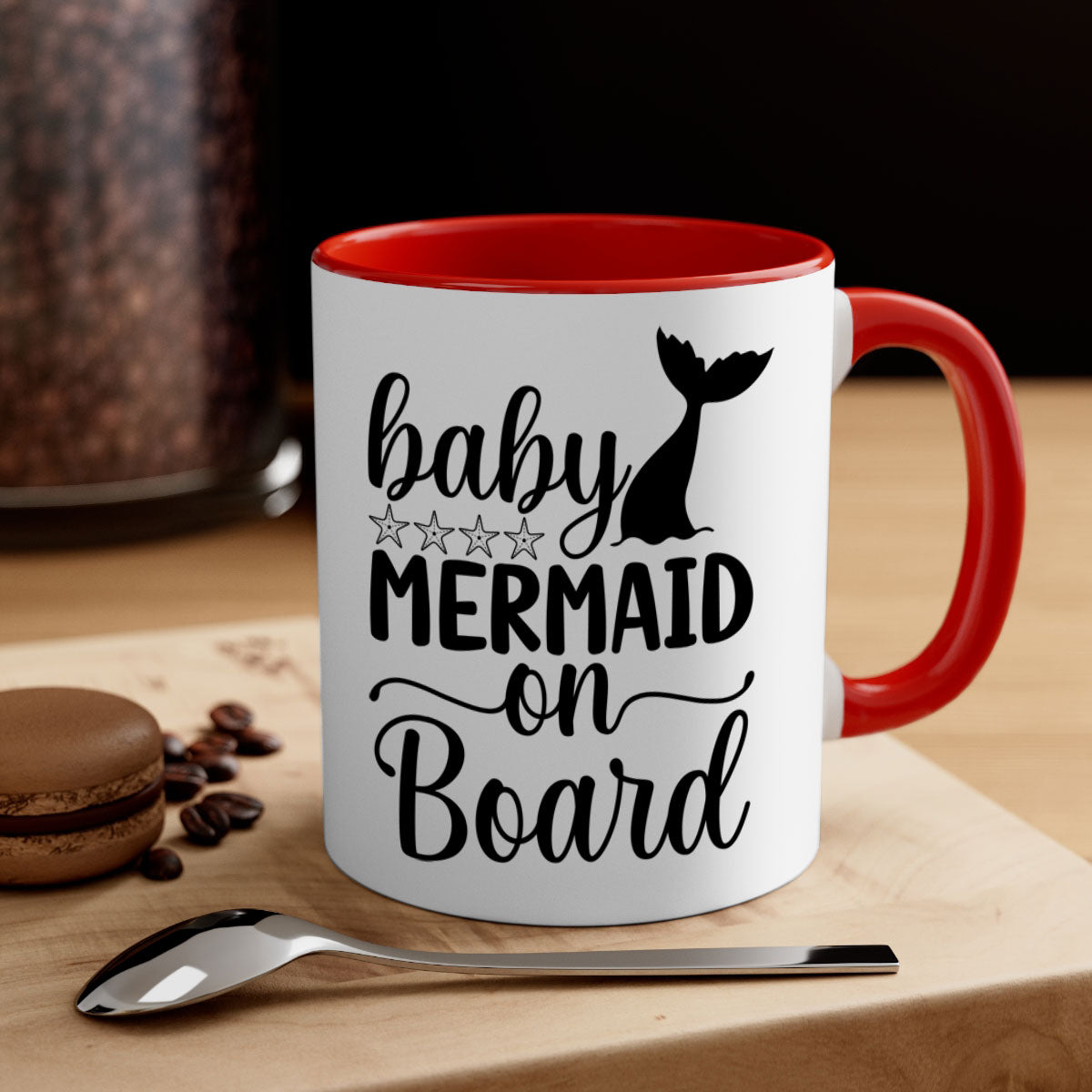 A colorful Baby Mermaid on Board Mug with a glossy finish, featuring a whimsical mermaid design and a comfortable C-shaped handle.