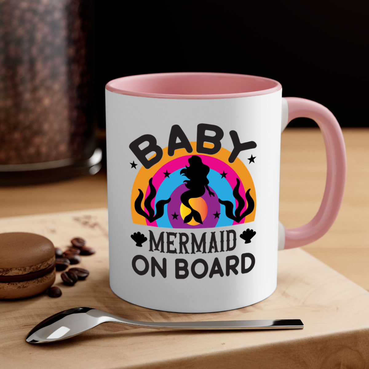 A colorful Baby Mermaid on Board Mug featuring a glossy finish and a C-shaped handle, available in multiple colors.