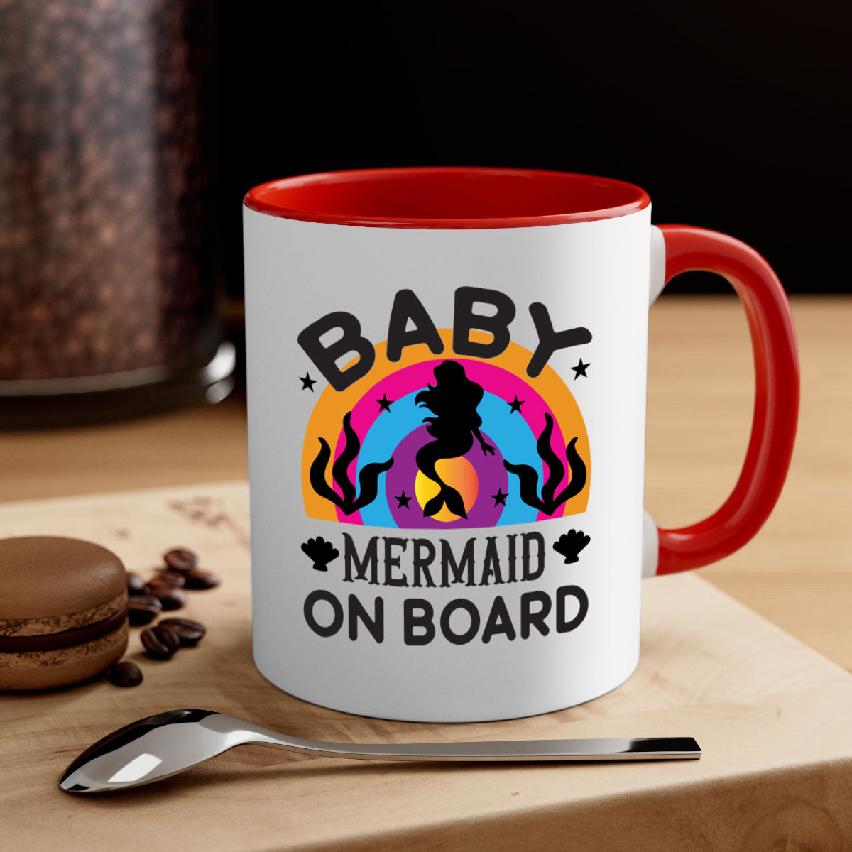 A colorful Baby Mermaid on Board Mug featuring a glossy finish and a C-shaped handle, available in multiple colors.