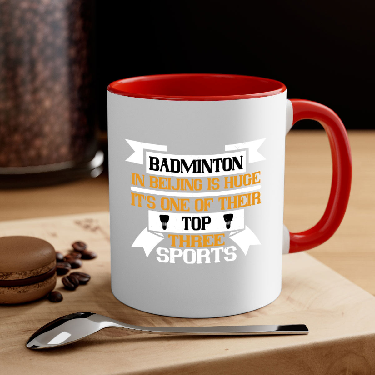 A stylish two-tone ceramic mug featuring a colored handle and glossy finish, perfect for badminton enthusiasts.