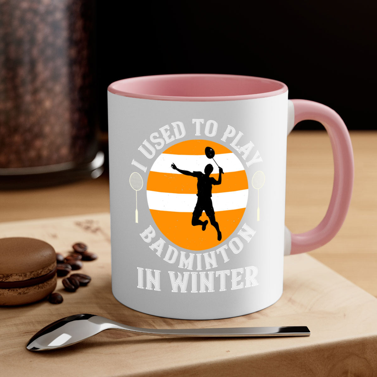 A stylish two-tone badminton-themed coffee mug with a colored handle and glossy finish, available in multiple colors.