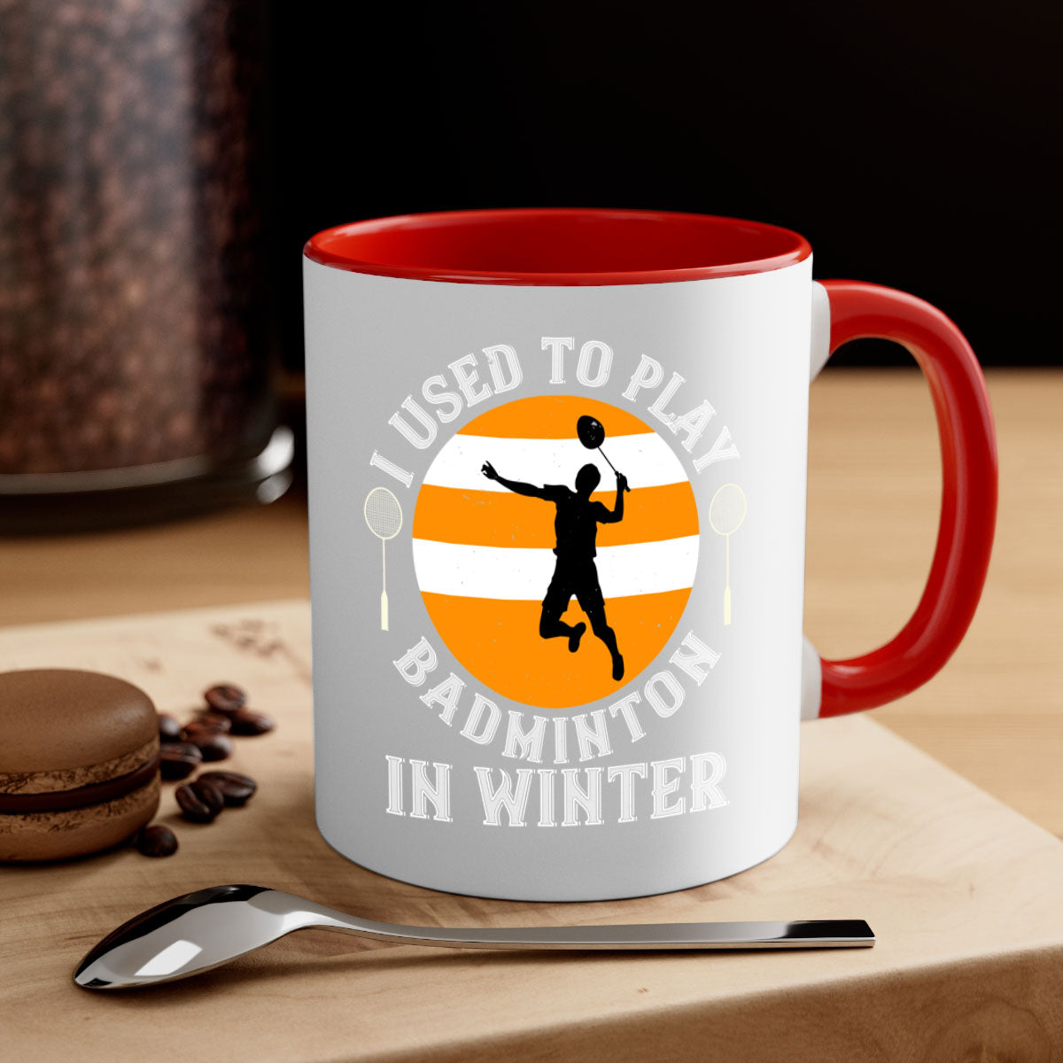 A stylish two-tone badminton-themed coffee mug with a colored handle and glossy finish, available in multiple colors.