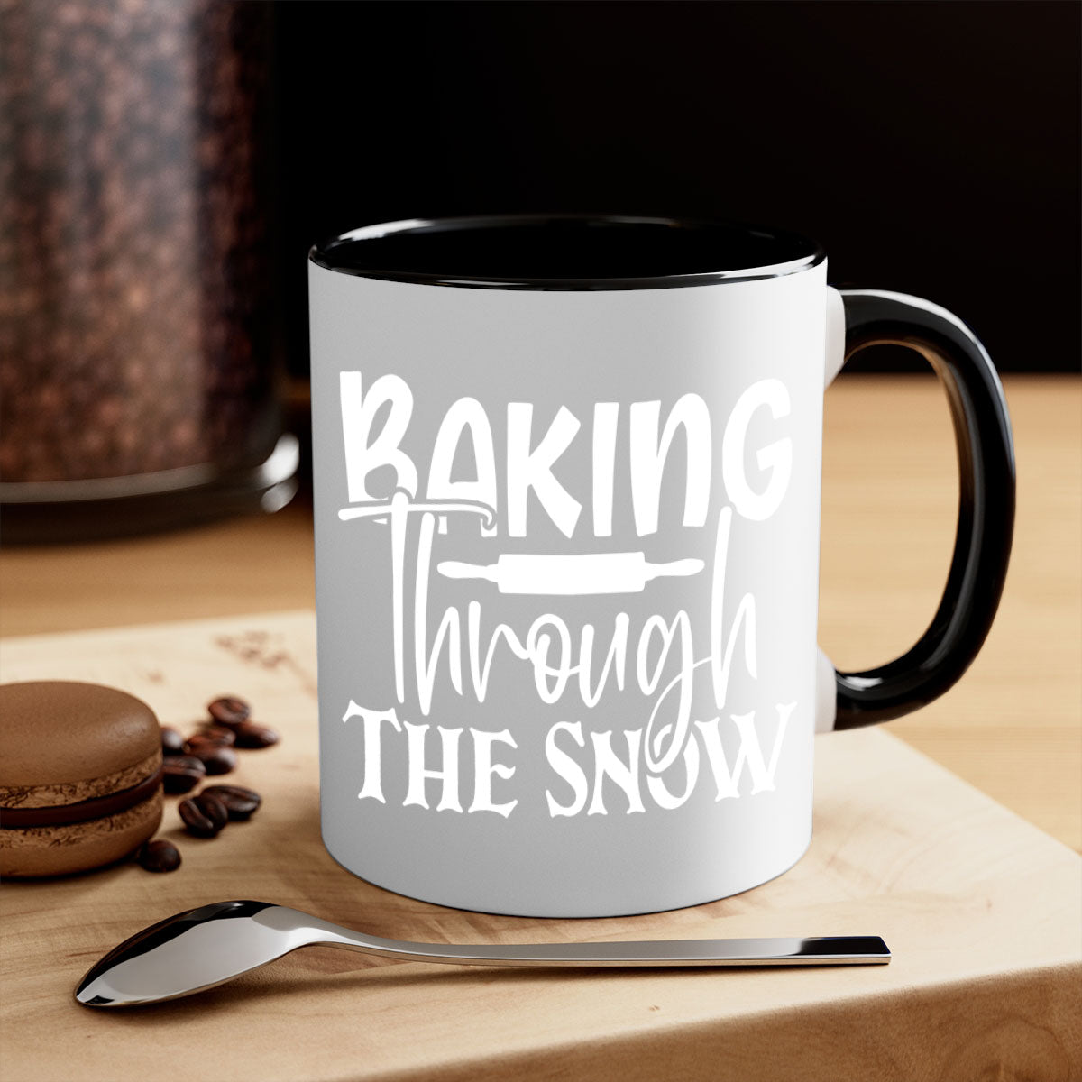 Baking Through the Snow 52# Mug with two-tone design, featuring a colored handle and glossy finish, available in multiple colors.