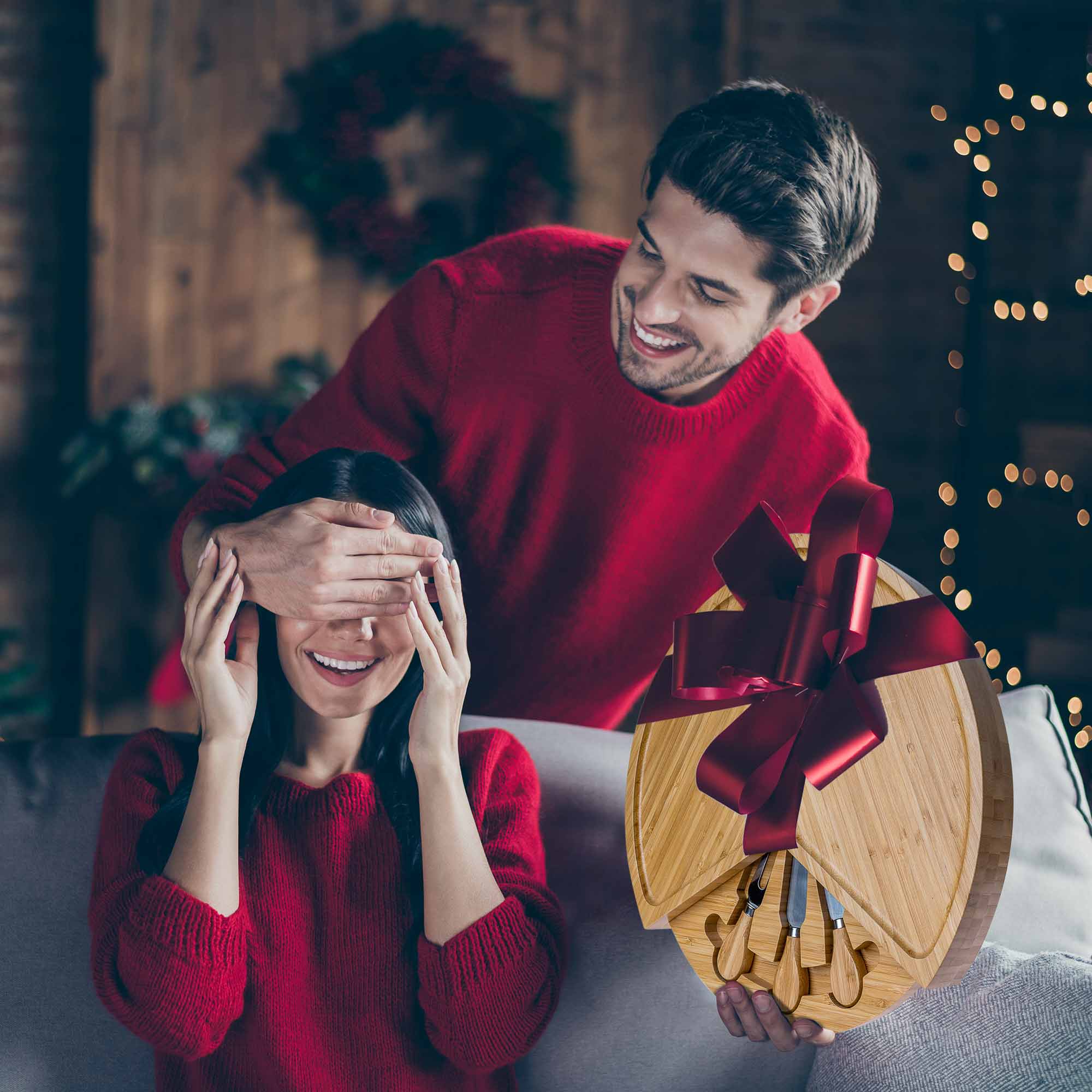 A stylish 14-inch bamboo cheese board with a knife set, featuring a smooth surface and hidden drawer for cheese tools, perfect for charcuterie presentations.