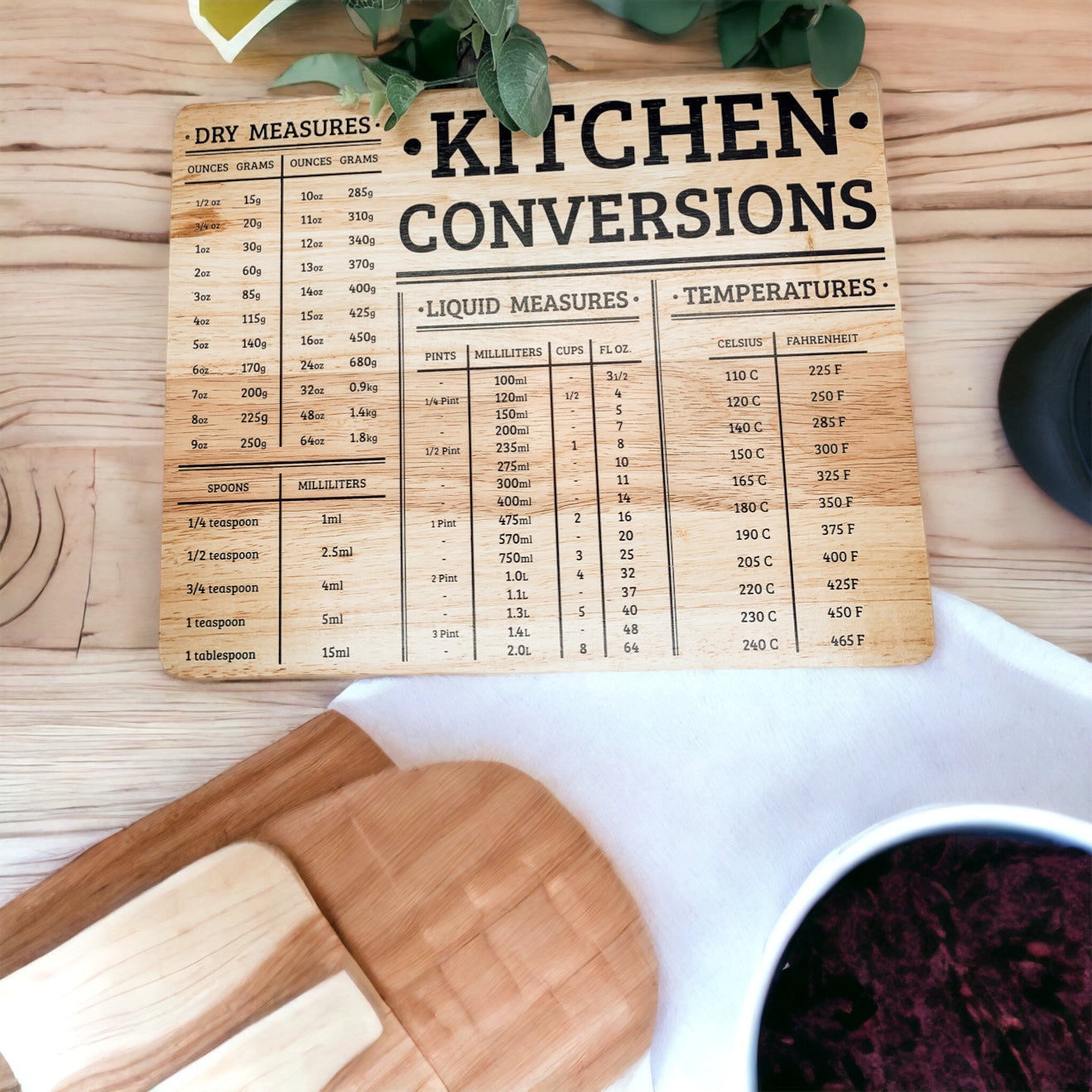 Bamboo Conversions 12.75x10" kitchen decor and cutting board, showcasing its dual functionality and natural bamboo finish.