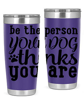 20oz stainless steel tumbler with a printed design saying 'Be the Person Your Dog Thinks You Are', featuring a drink-thru lid.