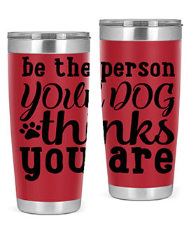 20oz stainless steel tumbler with a printed design saying 'Be the Person Your Dog Thinks You Are', featuring a drink-thru lid.