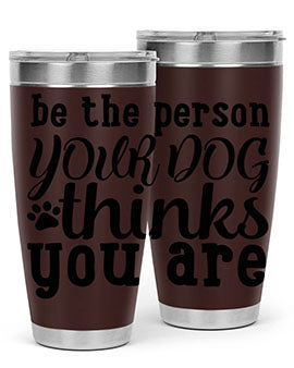 20oz stainless steel tumbler with a printed design saying 'Be the Person Your Dog Thinks You Are', featuring a drink-thru lid.
