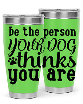 20oz stainless steel tumbler with a printed design saying 'Be the Person Your Dog Thinks You Are', featuring a drink-thru lid.