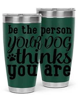 20oz stainless steel tumbler with a printed design saying 'Be the Person Your Dog Thinks You Are', featuring a drink-thru lid.