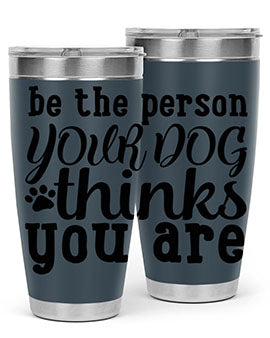 20oz stainless steel tumbler with a printed design saying 'Be the Person Your Dog Thinks You Are', featuring a drink-thru lid.