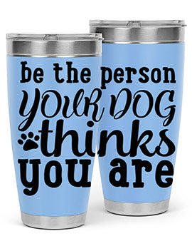 20oz stainless steel tumbler with a printed design saying 'Be the Person Your Dog Thinks You Are', featuring a drink-thru lid.