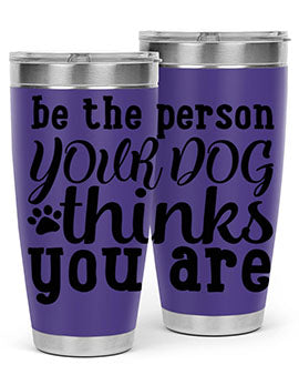 20oz stainless steel tumbler with a printed design saying 'Be the Person Your Dog Thinks You Are', featuring a drink-thru lid.