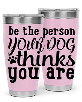 20oz stainless steel tumbler with a printed design saying 'Be the Person Your Dog Thinks You Are', featuring a drink-thru lid.