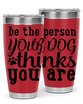 20oz stainless steel tumbler with a printed design saying 'Be the Person Your Dog Thinks You Are', featuring a drink-thru lid.