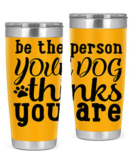 20oz stainless steel tumbler with a printed design saying 'Be the Person Your Dog Thinks You Are', featuring a drink-thru lid.