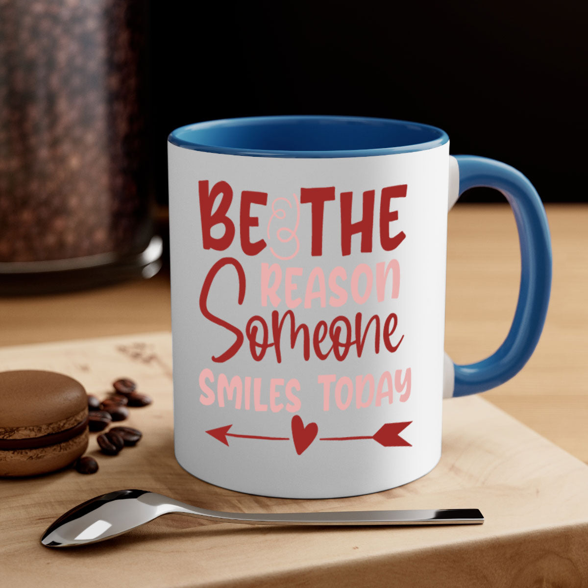 Be The Reason Someone Smiles Today Mug with colorful handle and glossy finish, available in multiple colors and sizes.