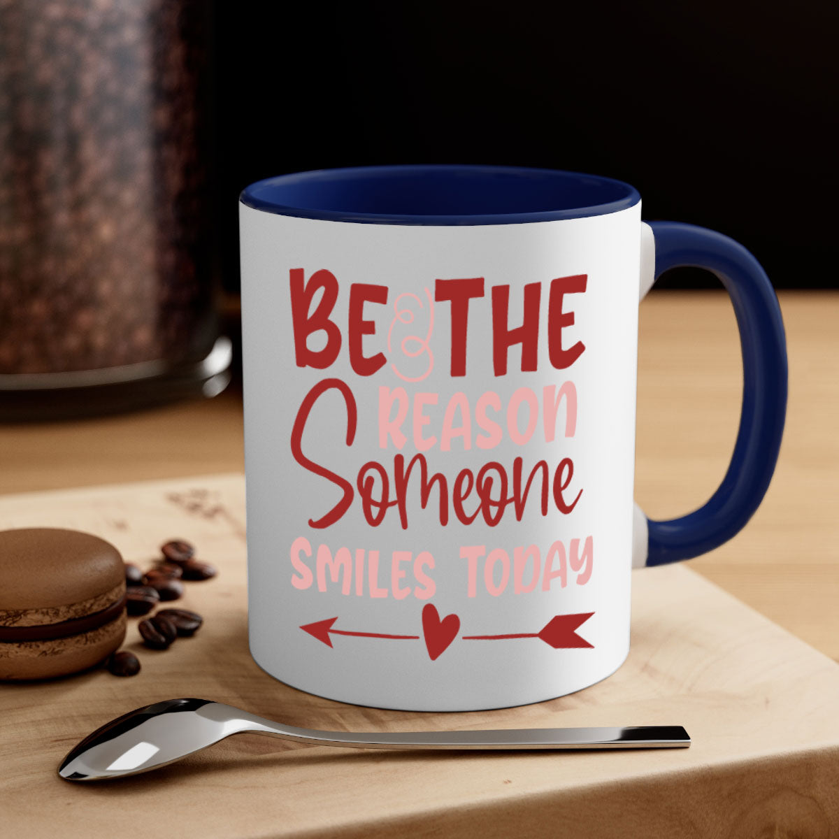 Be The Reason Someone Smiles Today Mug with colorful handle and glossy finish, available in multiple colors and sizes.