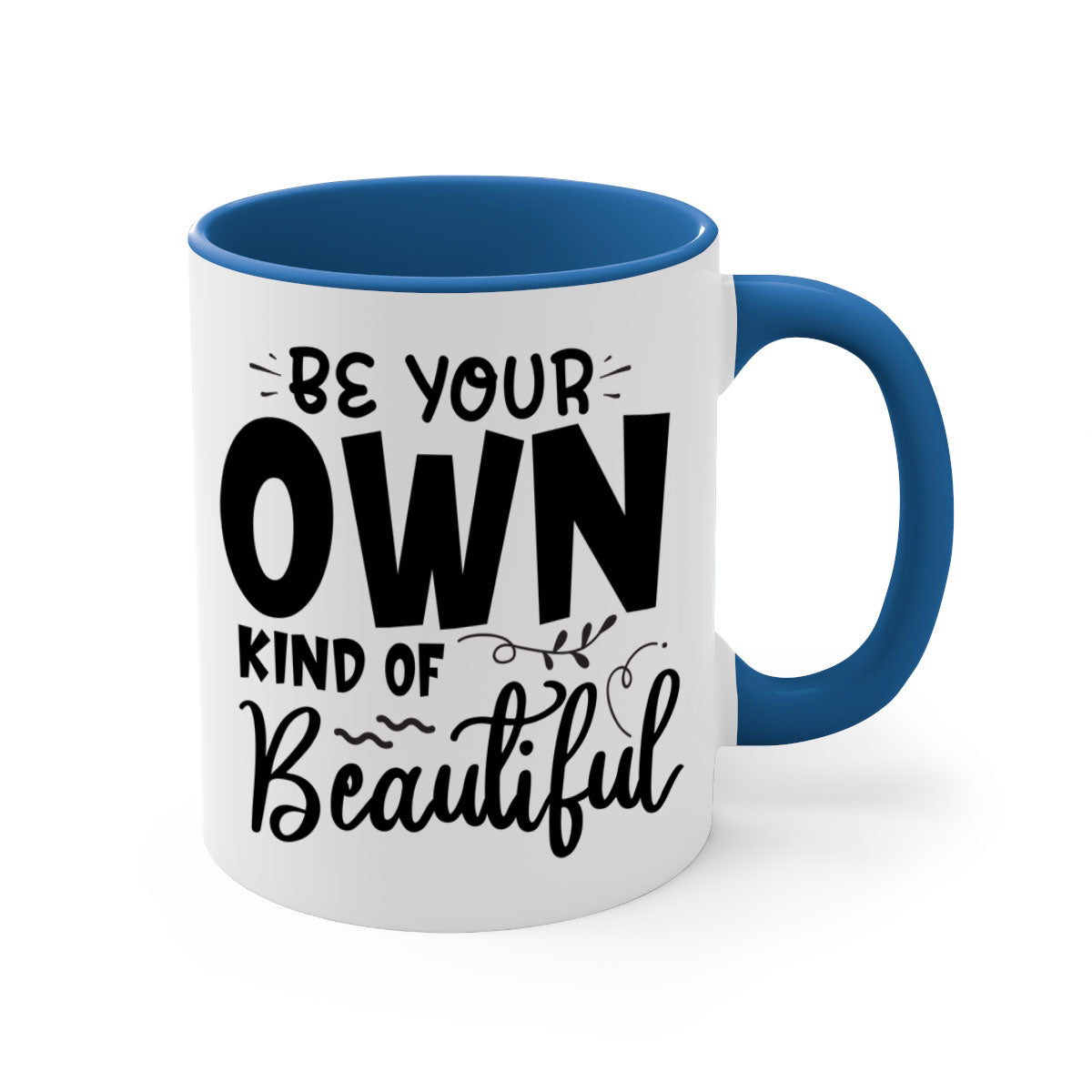 A stylish two-tone ceramic coffee mug with a glossy finish, featuring the phrase 'Be Your Own Kind of Beautiful' and a comfortable C-shaped handle.