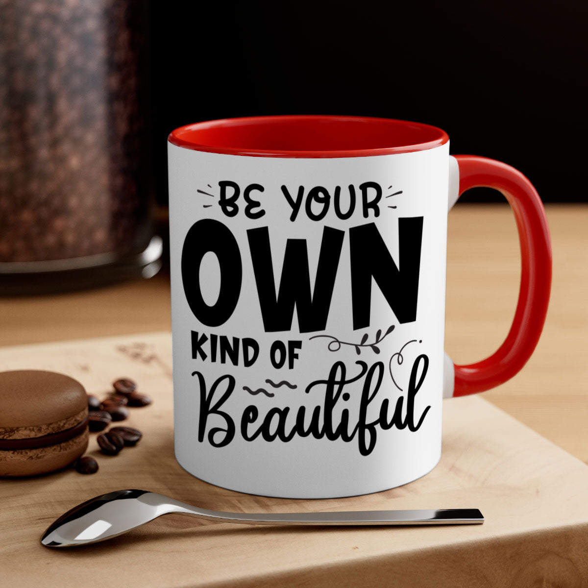 A stylish two-tone ceramic coffee mug with a glossy finish, featuring the phrase 'Be Your Own Kind of Beautiful' and a comfortable C-shaped handle.