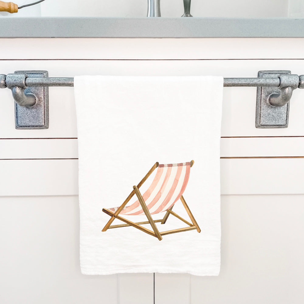 A vibrant Beach Chair cotton tea towel featuring a beautiful design, made from 100% absorbent cotton, ideal for kitchen use.