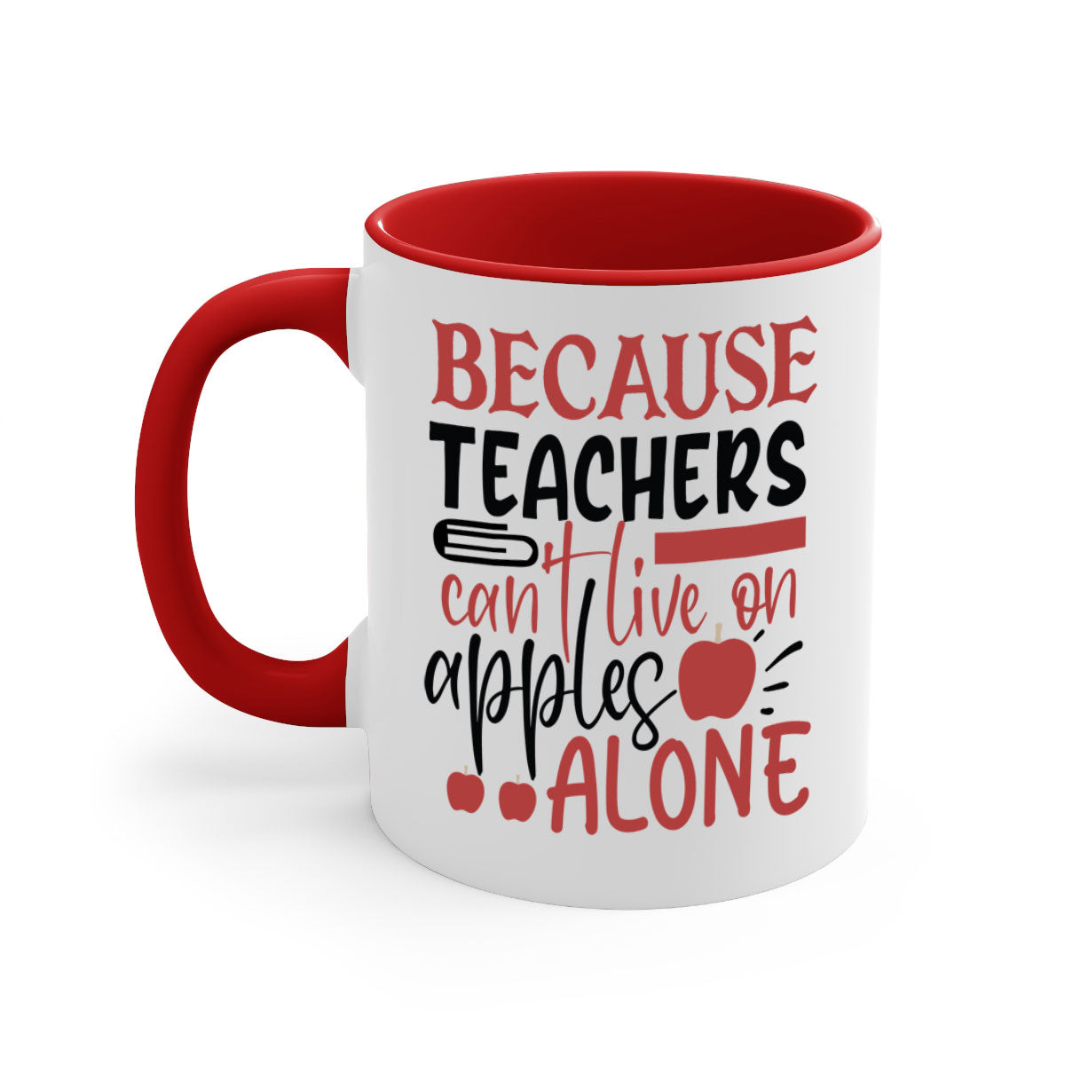 A two-tone ceramic mug with a colored handle and interior, featuring the phrase 'Because Teachers Can't Live on Apples Alone' in a stylish font.