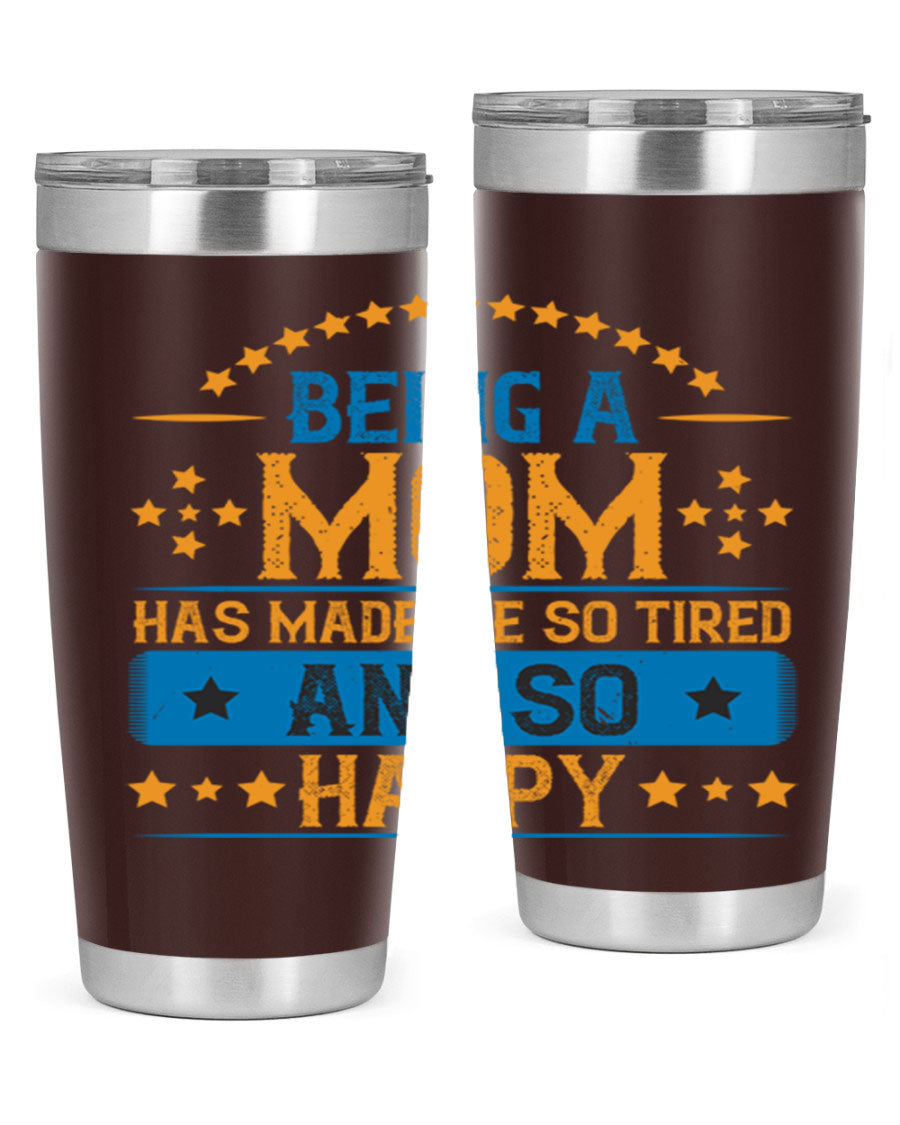 A stylish stainless steel tumbler with the phrase 'Being a Mom Has Made Me So Tired and So Happy', featuring a double wall vacuum design.
