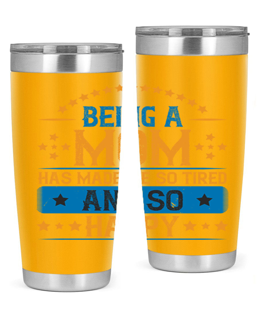 A stylish stainless steel tumbler with the phrase 'Being a Mom Has Made Me So Tired and So Happy', featuring a double wall vacuum design.