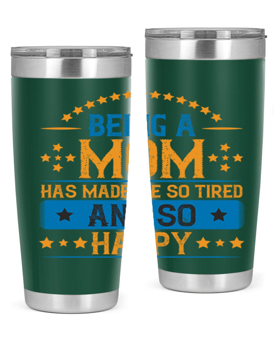 A stylish stainless steel tumbler with the phrase 'Being a Mom Has Made Me So Tired and So Happy', featuring a double wall vacuum design.