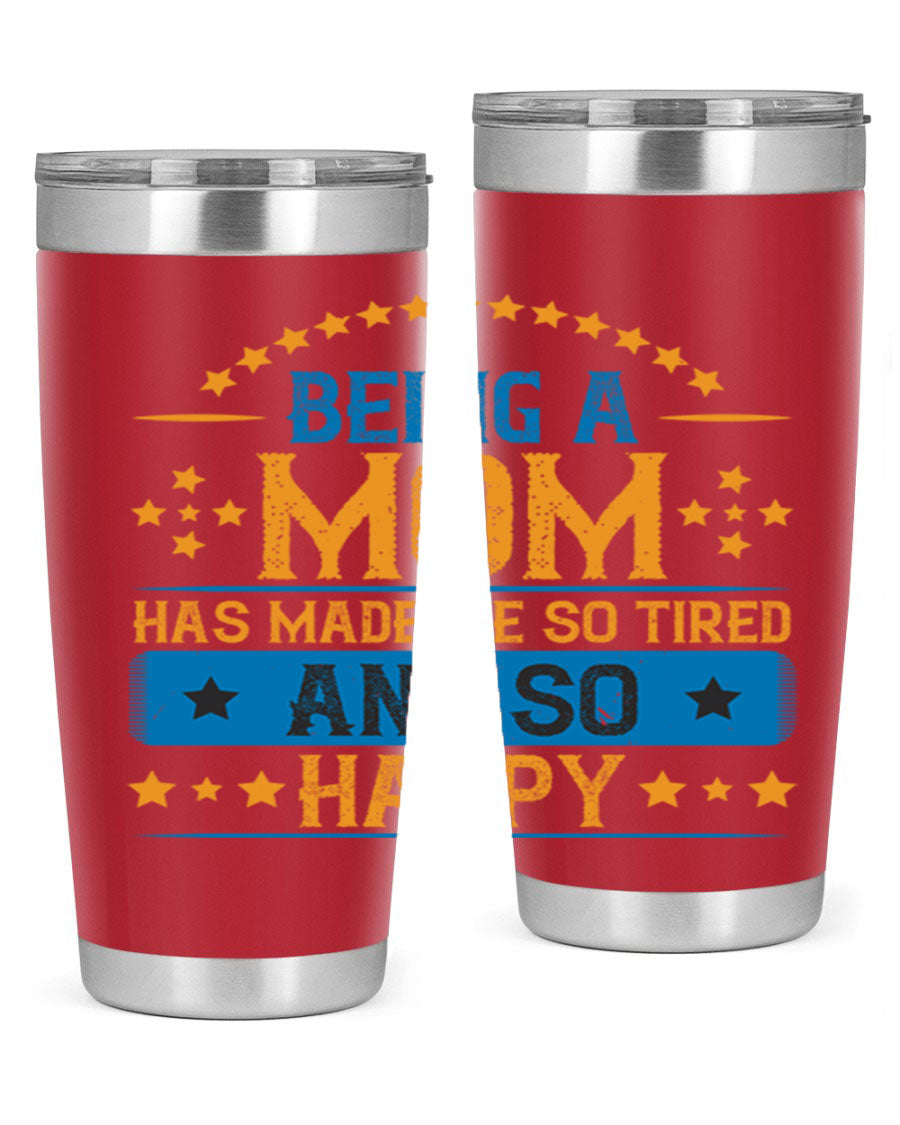 A stylish stainless steel tumbler with the phrase 'Being a Mom Has Made Me So Tired and So Happy', featuring a double wall vacuum design.